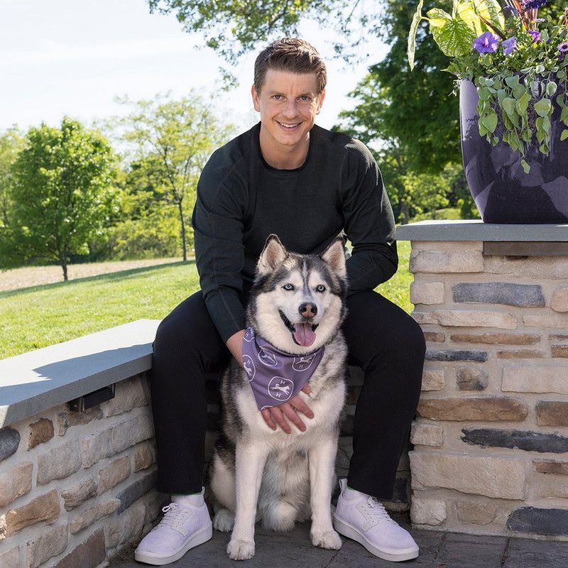 Colin and Rocky sitting together outside