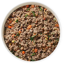 Top down picture of a bowl of frozen dog food