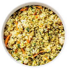 Top down picture of a bowl of home cooked dog food